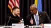 Ukraine's President Volodymyr Zelenskiy and U.S. Defense Secretary Lloyd Austin shake hands at the Ukraine Defense Contact Group meeting at Ramstein Air Base, Germany, Jan. 9, 2025.