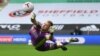 Sheffield United&#39;s English goalkeeper Aaron Ramsdale makes a save during the English Premier League football match between Sheffield United and Fulham at Bramall Lane in Sheffield, northern England.