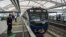 Kereta Moda Raya Terpadu (MRT) Jakarta menunggu para penumpang setelah peresmiuan untuk umum, 12 Maret 2019. (Foto: AFP)
