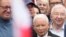 The leader of Poland's right-wing opposition party Law and Justice, Jaroslaw Kaczynski, front, attends the party's protest rally of a few thousand backers against the policies of Prime Minister Donald Tusk before the Ministry of Justice in Warsaw on Sept. 14, 2024.
