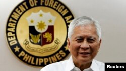 FILE - Philippine Foreign Affairs Secretary Albert Del Rosario at the Department of Foreign Affairs headquarters in Manila, Sept. 4, 2013. 