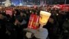 S. Koreans Demand Leader's Removal in New Year's Eve Protest