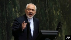 FILE - Iranian Foreign Minister Mohammad Javad Zarif addresses an open session of parliament in Tehran.