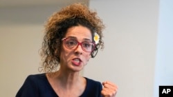 FILE - Iranian dissident Masih Alinejad gestures as she speaks during an interview with The Associated Press, Sept. 23, 2022, in New York. Alinejad was the target of a 2021 kidnapping attempt in New York, which the FBI says was part of a Tehran plot to bring her to Iran. 
