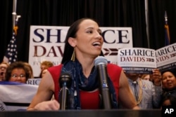 FILE - Democrat House candidate Sharice Davids speaks to supporters at a victory party in Olathe, Kan., Nov. 6, 2018.