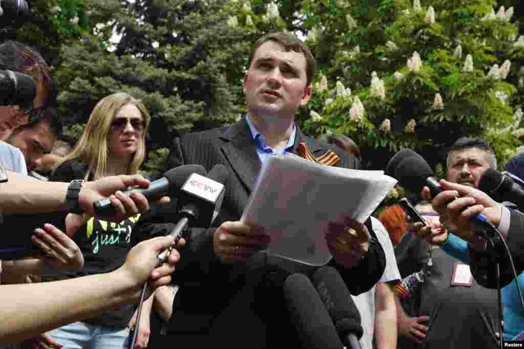 Alexander Malykhin, head of a local election committee, announces the results of the referendum on the status of Luhansk region, in Luhansk, May 12, 2014.