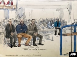 This court sketch drawn on Jan. 9, 2024, at the Assize court in Bobigny, near Paris, shows the three police officers on trial. They are, from left, Marc-Antoine Castelain, 34, Jeremie Dulin, 42, and Tony Hochart, 31.