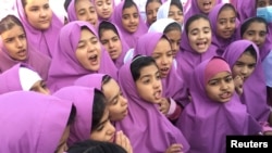 REUTERS - IRANIAN AND AFGHAN GIRLS AT EMAM HASAN MOJTABA SCHOOL IN KERMAN, IRAN