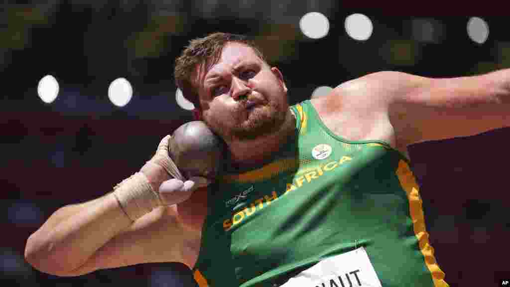 Kyle Blignaut, of South Africa, competes in the final of the men's shot put at the 2020 Summer Olympics, Thursday, Aug. 5, 2021, in Tokyo. (AP Photo/Matthias Schrader)