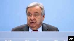 FILE - United Nations Secretary-General Antonio Guterres speaks during a news conference after the conference on Libya at the chancellery in Berlin, Germany, Jan. 19, 2020.