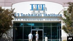 FILE - Students find the doors locked to the ITT Technical Institute campus in Rancho Cordova, Calif.