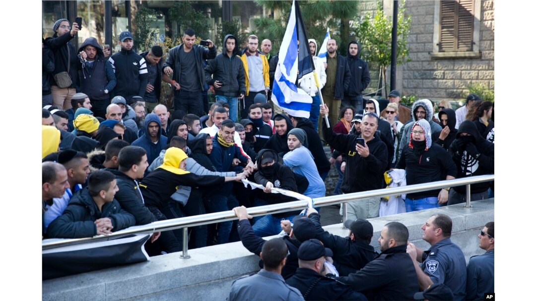 Right wing supporters of Israeli solider, Sgt. Elor Azaria, scuffle outside a Israeli military court in Tel Aviv, Israel, Jan. 4, 2017. Scuffles erupted outside the court during the proceedings.
