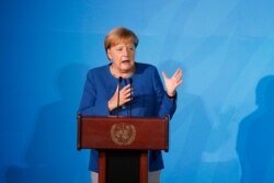 Germany's Chancellor Angela Merkel addresses the Climate Action Summit in the United Nations General Assembly, at U.N. headquarters, Sept. 23, 2019.