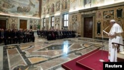 Pope Francis attends an audience with the Officials of the Vatican Secret Archive at the Vatican, March 4, 2019. 