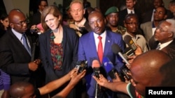 FILE - Samantha Power, the United States' U.N. ambassador, and Burundian President Pierre Nkurunziza speak to reporters in Gitega, Burundi, Jan. 22, 2016.