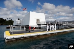 FILE - USS Arizona Memorial, part of the World War II Valor in the Pacific National Monument, in Joint Base Pearl Harbor-Hickam, Hawaii, adjacent to Honolulu, Hawaii.