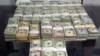 This 2014 U.S. Customs and Border Protection photo shows $189,300 in unreported U.S. currency seized from a Mexican man who attempted to smuggle the cash into the United States.