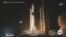 Modern-day moonshot blasts off from Earth