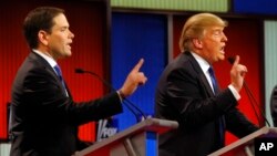 Ứng viên tổng thống của Đảng Cộng hòa Marco Rubio (trái) và Donald Trump tranh cãi trong một cuộc tranh luận trực tiếp hôm 3/3.