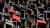 FILE - In this Aug. 6, 2011, picture, students attend graduation ceremonies at the University of Alabama in Tuscaloosa, Ala. 