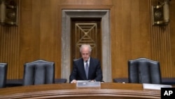 FILE - Republican Sen. Bob Corker, chairman of the Senate Foreign Relations Committee, arrives to lead a hearing on Capitol Hill in Washington, Feb. 9, 2017.