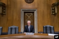 FILE - Republican Sen. Bob Corker, chairman of the Senate Foreign Relations Committee, arrives to lead a hearing on Capitol Hill in Washington, Feb. 9, 2017.