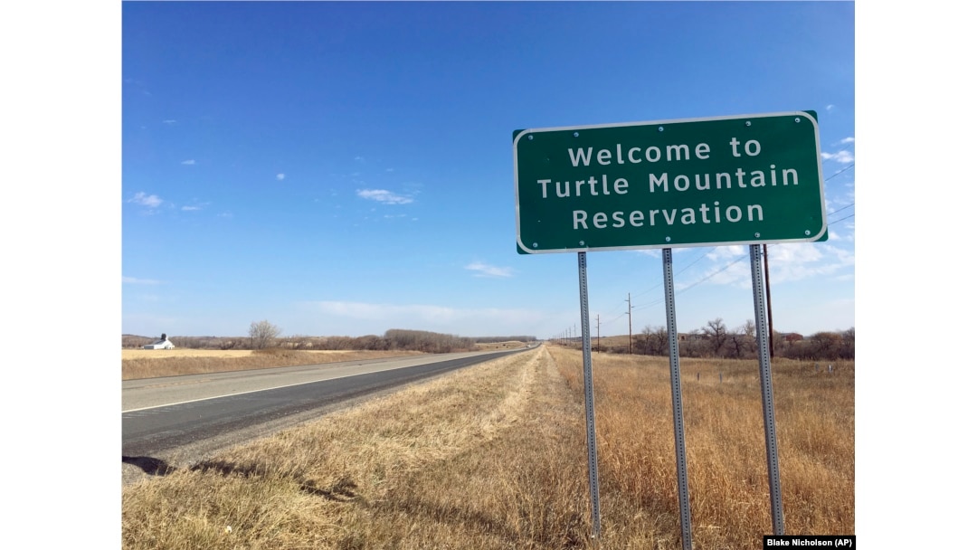 A sign marks the Turtle Mountain Reservation, home of the Turtle Mountain Band of Chippewa Indians, in Belcourt, North Dakota. Native groups complain that national exit polls were not conducted on any tribal lands on Election Day, Nov. 5, 2024.