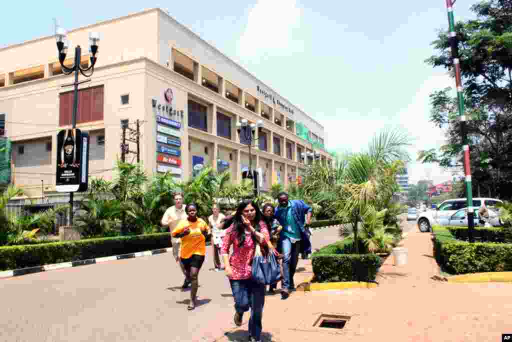 People run from the Westgate Mall in Nairobi, Sept. 21 2013. 