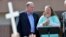 Rowan County Clerk Kim Davis, with Republican presidential candidate Mike Huckabee at her side, speaks after being released from the Carter County Detention Center in Grayson, Kentucky, Sept. 8, 2015.