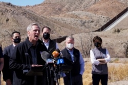 FILE - House Minority Leader Kevin McCarthy speaks to the press during a tour for a delegation of Republican lawmakers of the U.S.-Mexico border, in El Paso, Texas, March 15, 2021.
