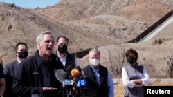 House Minority Leader Kevin McCarthy speaks to the press during a tour for a delegation of Republican lawmakers of the US-Mexico border, in El Paso, Texas, March 15, 2021. 