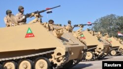 Armored vehicles of Iraqi army are seen during an Iraqi military parade in Baghdad's fortified Green Zone, Iraq December 10, 2017. REUTERS/Stringer NO RESALES. NO ARCHIVES - RC1A19083730