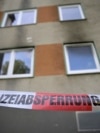 Police cordon is seen in front of an apartment building in Essen, western Germany, on Sept. 29, 2024, the day after a fire broke out at the building. 