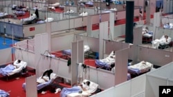 A view of a temporary field hospital set at Ifema convention and exhibition of in Madrid, Spain, Thursday, April 2, 2020. 