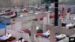 A view of a temporary field hospital set at Ifema convention and exhibition of in Madrid, Spain, Thursday, April 2, 2020. 