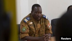 Lieutenant Colonel Isaac Zida meets with opposition leaders in Ouagadougou, capital of Burkina Faso, Nov. 2, 2014.