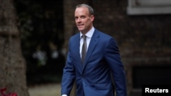 Dominic Raab, recently appointed as Justice Secretary, walks outside Downing Street in London, Britain, September 15, 2021. 