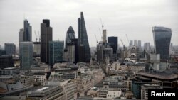 FILE - A view of the London skyline shows the City of London financial district, seen from St Paul's Cathedral in London, Feb. 25, 2017. 