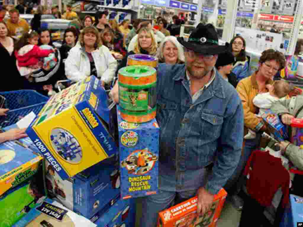 Stores across the United States hold massive after Thanksgiving sales for what is known as Black Friday. The deals draw huge crowds. (AP)
