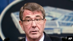 FILE - Defense Secretary Ash Carter is expected to approve lifting a ban on transgender troops serving in the U.S. military.