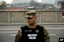 Presidential helicopters are grounded as President Donald Trump returned to U.S. Army Garrison Yongsan, Seoul, South Korea, Nov. 8, 2017, after attempting to visit the Demilitarized Zone (DMZ).