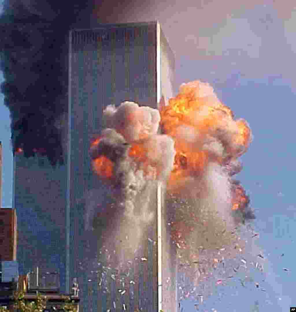A fireball explodes from one of the World Trade Center towers after a jet airliner crashed into the building in New York.