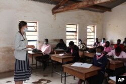 Cameron Beach, teaches children in Dedza, near Lilongwe, Malawi, July 23, 2021.