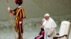 Pope Francis leads a special audience to deliver a Christmas message to Vatican workers at the Paul VI Hall at the Vatican, Dec. 23, 2021.