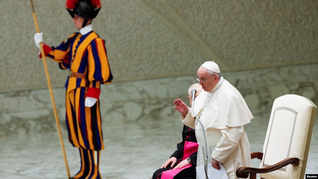Pope Francis leads a special audience to deliver a Christmas message to Vatican workers at the Paul VI Hall at the Vatican, Dec. 23, 2021.