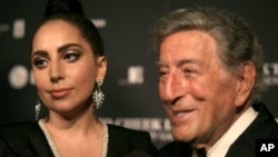 Recording artists Lady Gaga, left, and Tony Bennett, attend a Tony Bennett and Lady Gaga concert taping in New York, July 28, 2014. 