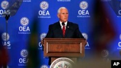 Vice President Mike Pence speaks at the Organization of American States, Monday, May 7, 2018 in Washington. (AP Photo/Jacquelyn Martin)