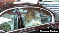 Britain's Prince Philip leaves the King Edward VII hospital in the back of a car in London, March 16, 2021.