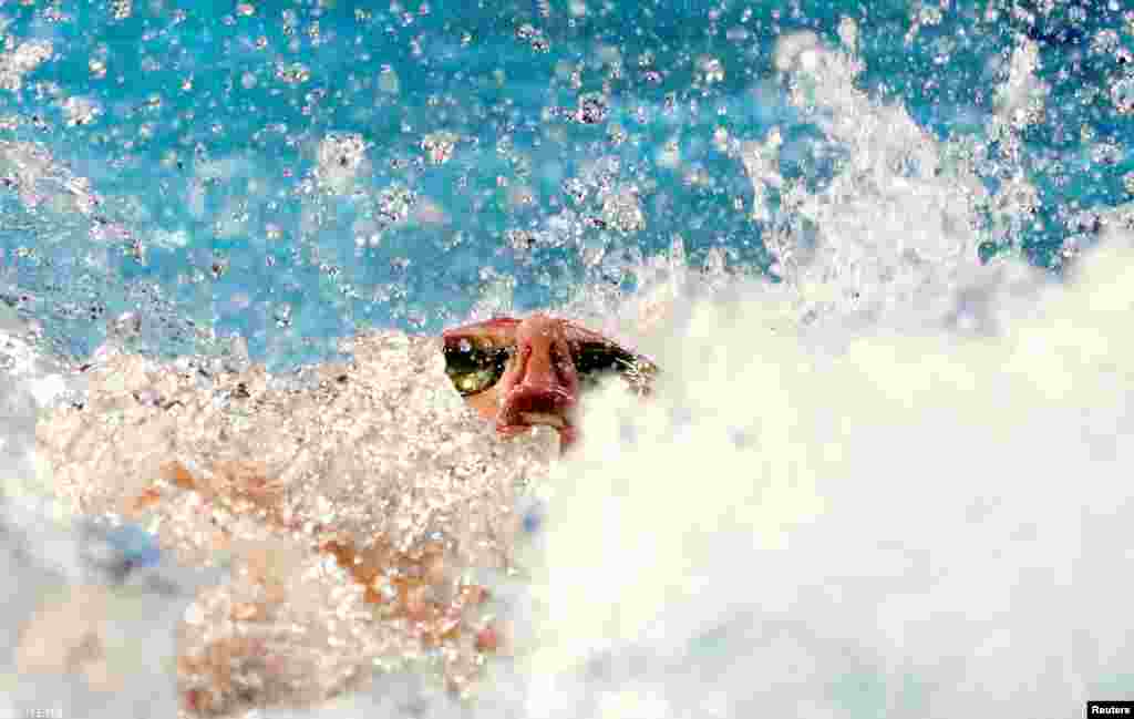 Elliot Clogg of England competes in the men's 100m backstroke at the Gold Coast 2018 Commonwealth Games in Australia.