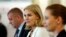 Denmark's Social Democrats, headed by Prime Minieter Helle Thorning-Schmidt, center, Minister of Finance Bjarke Corydon, left, and Minister of Justice Mette Frederiksen, attend press conference, Copenhagen, June 17, 2015.